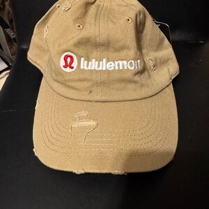 lululemon athletica tan baseball cap with red logo